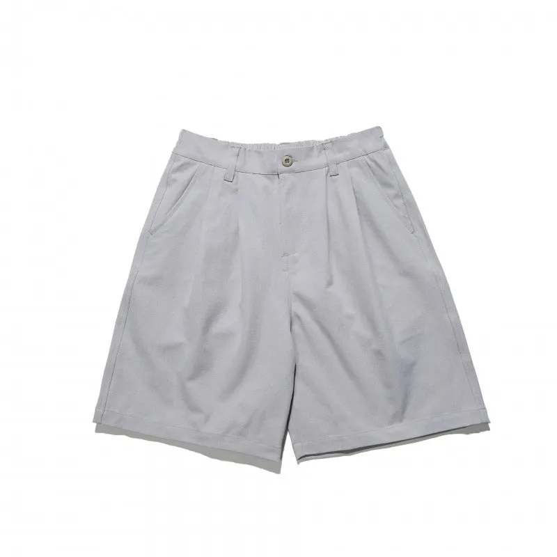 Loose straight drooping suit shorts in light grey, front view, with micro-elastic waist and retro style
