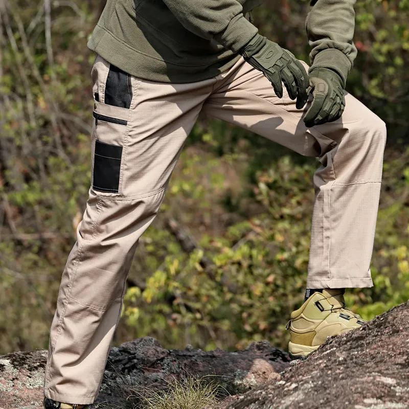 Men's multi-pocket water repellent outdoor trousers in army green, front view showing pockets and fabric texture