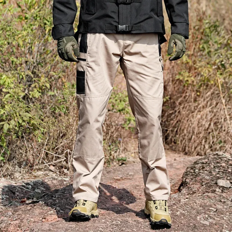 Men's multi-pocket water repellent outdoor trousers in army green, front view showing pockets and fabric texture