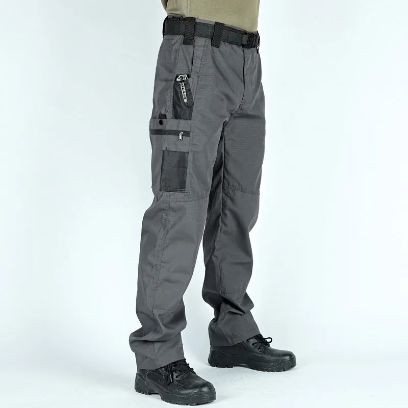 Men's multi-pocket water repellent outdoor trousers in army green, front view showing pockets and fabric texture