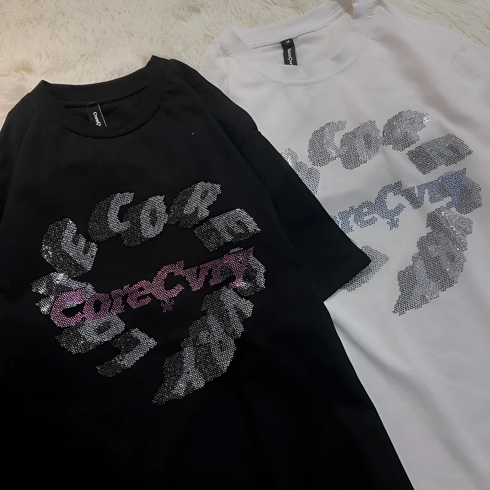 Loose fit summer T-shirt for men, round neck, short sleeve, in black or white, front view