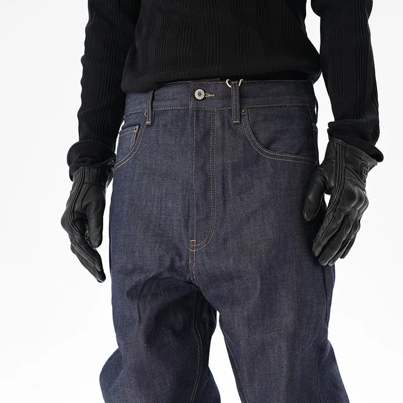 Man wearing dark blue loose fit straight leg denim jeans.