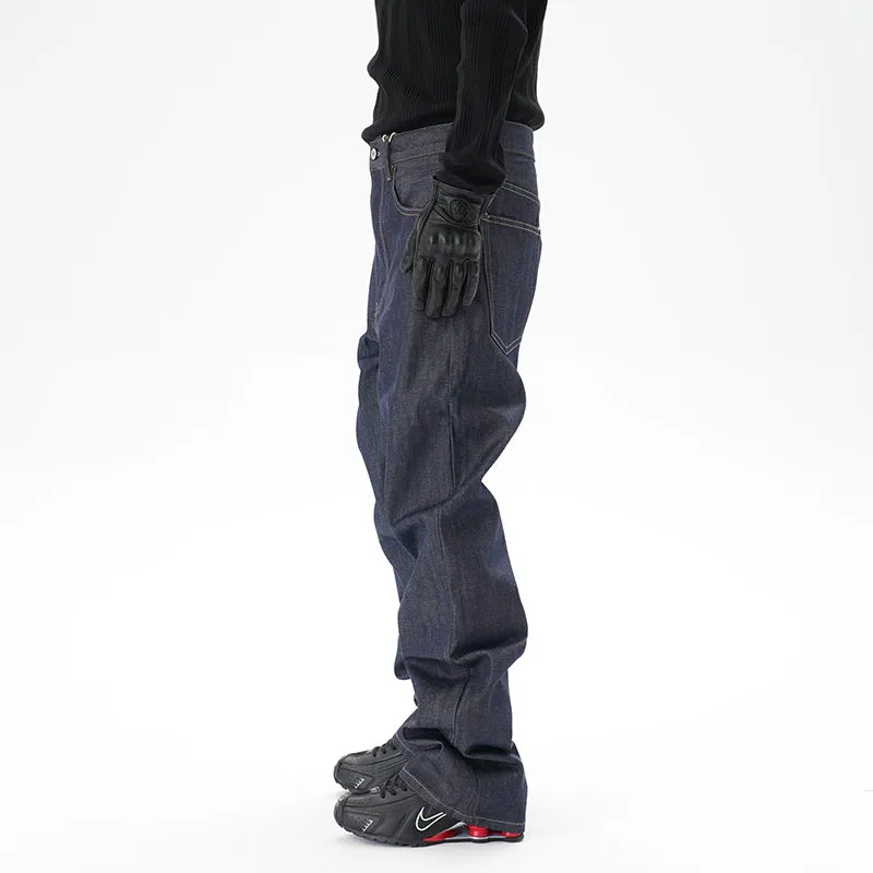 Man wearing dark blue loose fit straight leg denim jeans.