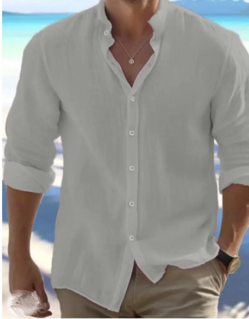 Men's long-staple cotton button summer beach shirt in light blue, showing pullover style and casual stitching detail.