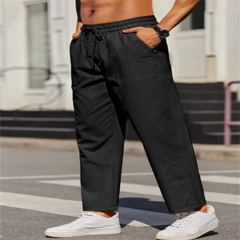 Men's straight-leg linen casual trousers in apricot colour with an elastic waistband.