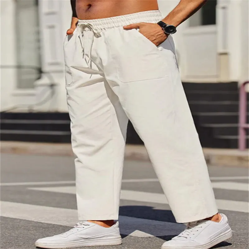 Men's straight-leg linen casual trousers in apricot colour with an elastic waistband.
