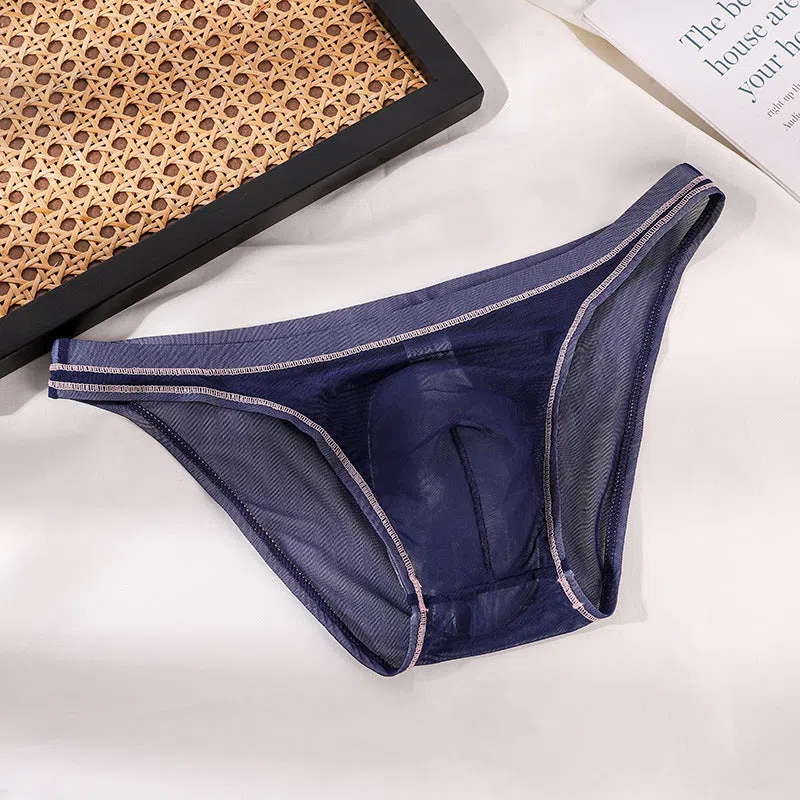 Transparent men's triangle underwear in white, seamless stretch knit nylon fabric, solid colour pattern