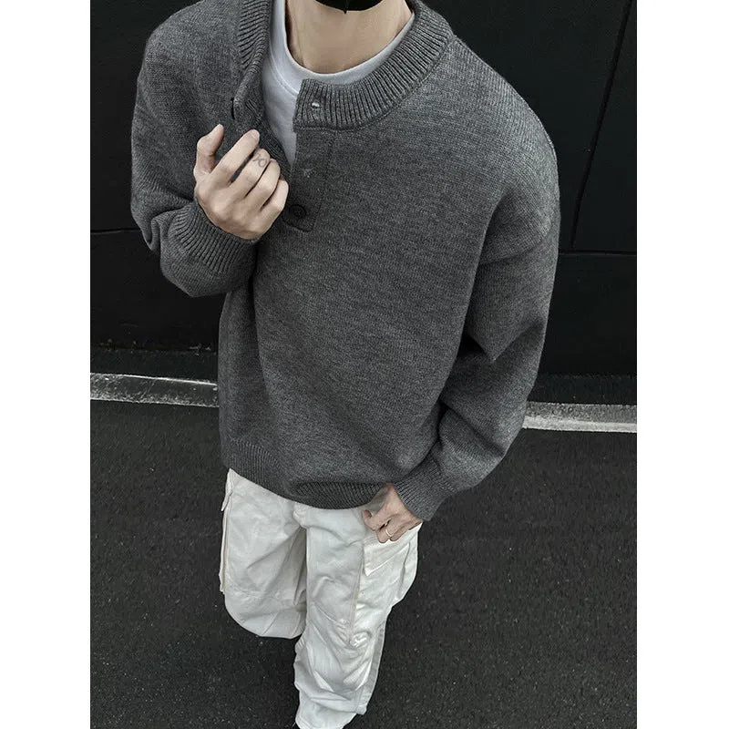 Men's loose Hong Kong style long sleeve polyester knit sweater in black, front view on model