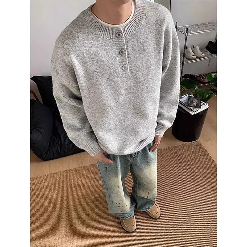 Men's loose Hong Kong style long sleeve polyester knit sweater in black, front view on model
