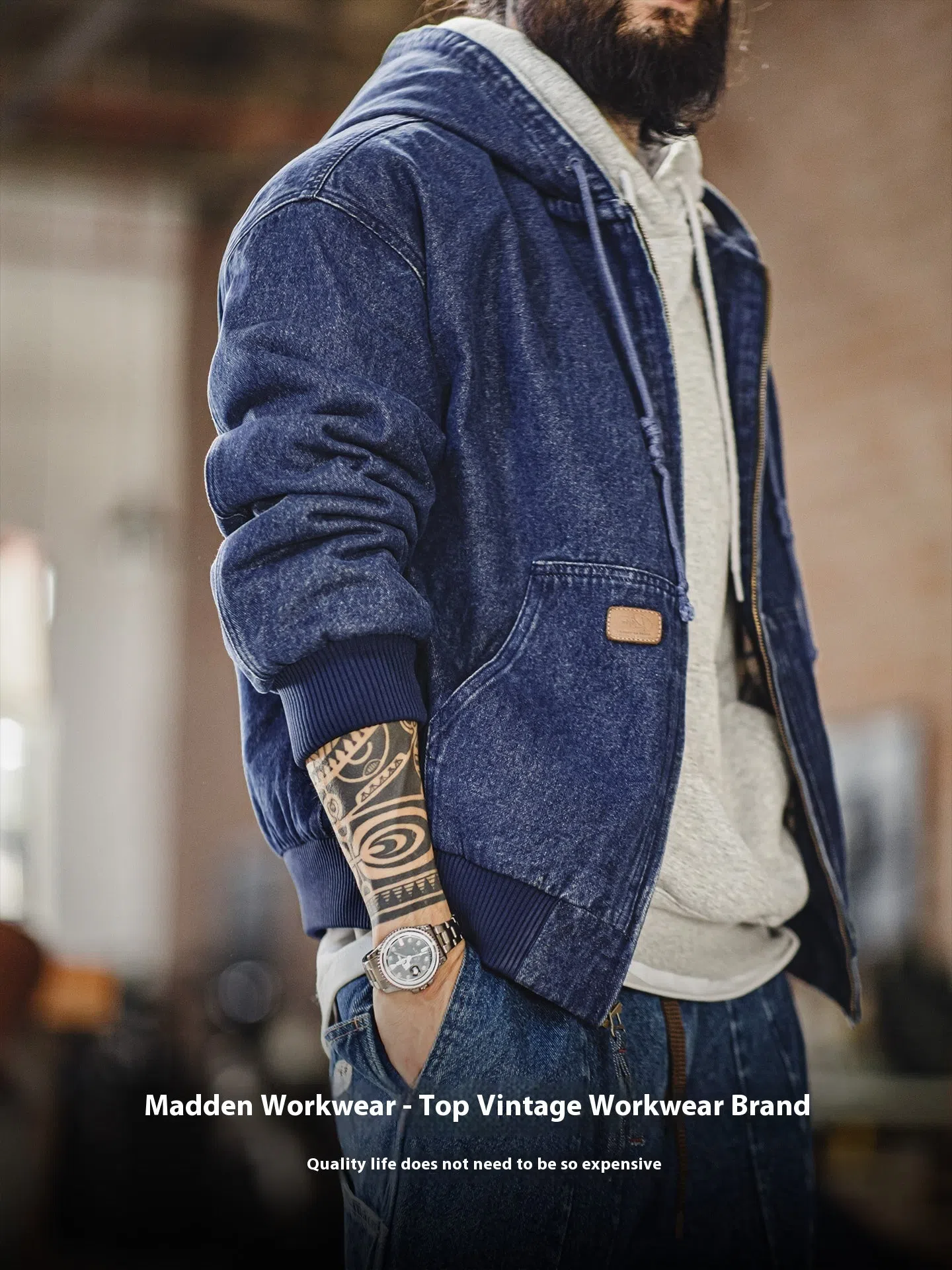 Blue tooling American retro washed denim jacket with hood and zipper front on hanger