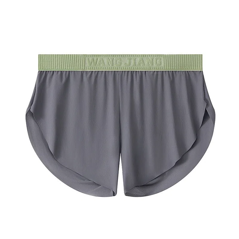 Men's seamless polyester low-waist shorts in light green, loose fit, summer homewear