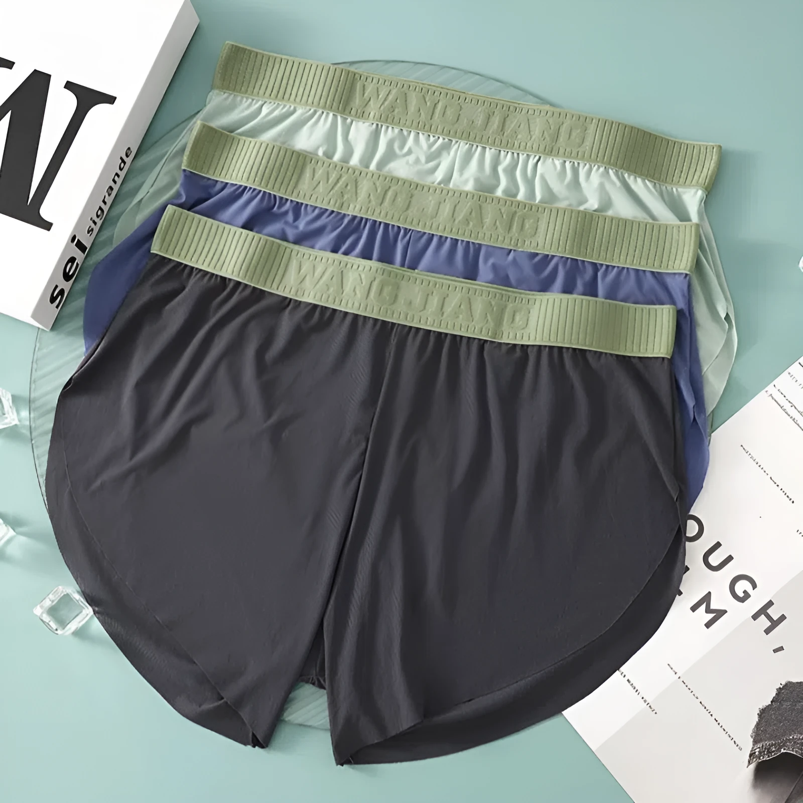 Men's seamless polyester low-waist shorts in light green, loose fit, summer homewear