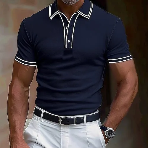 Man wearing a loose fit striped short-sleeved T-shirt in a casual setting