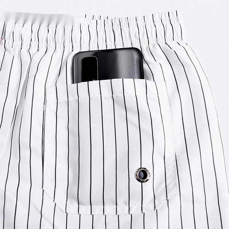 Men's quick-drying beach pants with white stripes, loose plus size, built-in lining, side view
