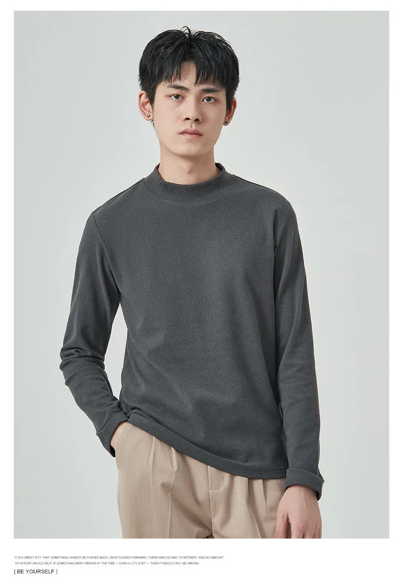 Men's solid colour half-high collar long sleeve t-shirt in Dralon fabric on a hanger.