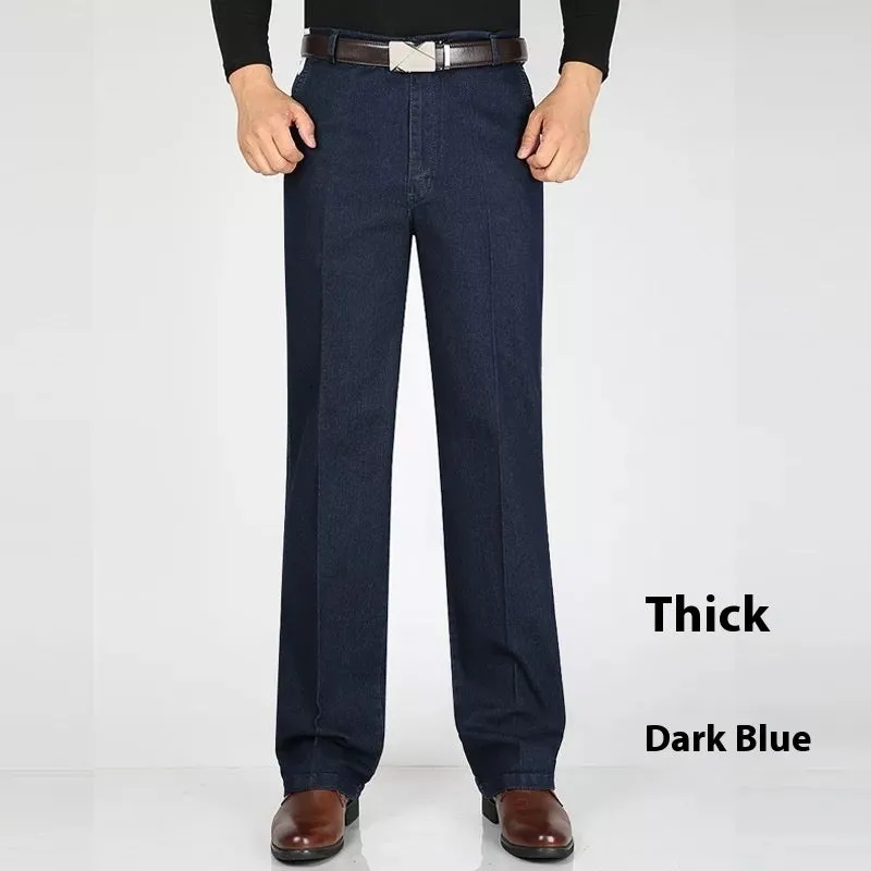 Men's loose fit high waist blue denim jeans on a plain background.