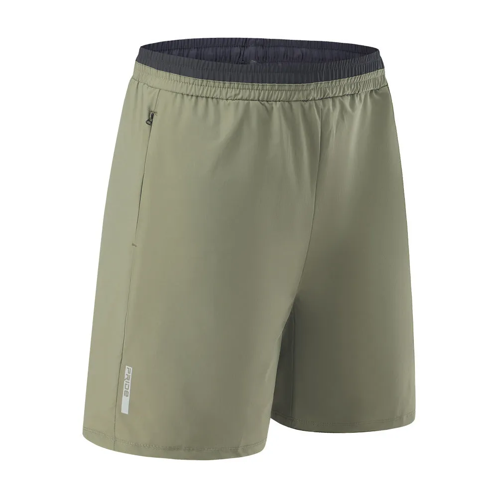 Man wearing grey loose-fit cropped Ice Silk pants for running or leisure.