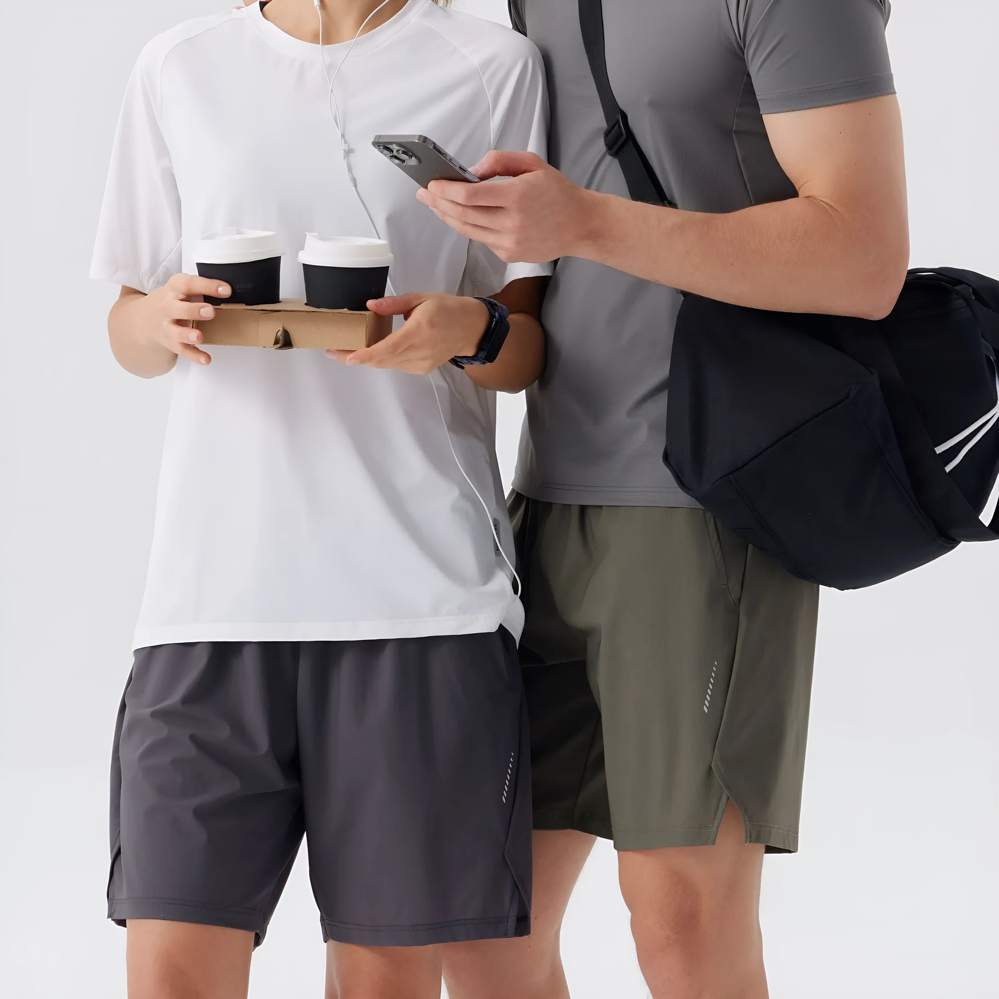 Men's black ice silk sports shorts made from breathable nylon fabric, mid-waist design.