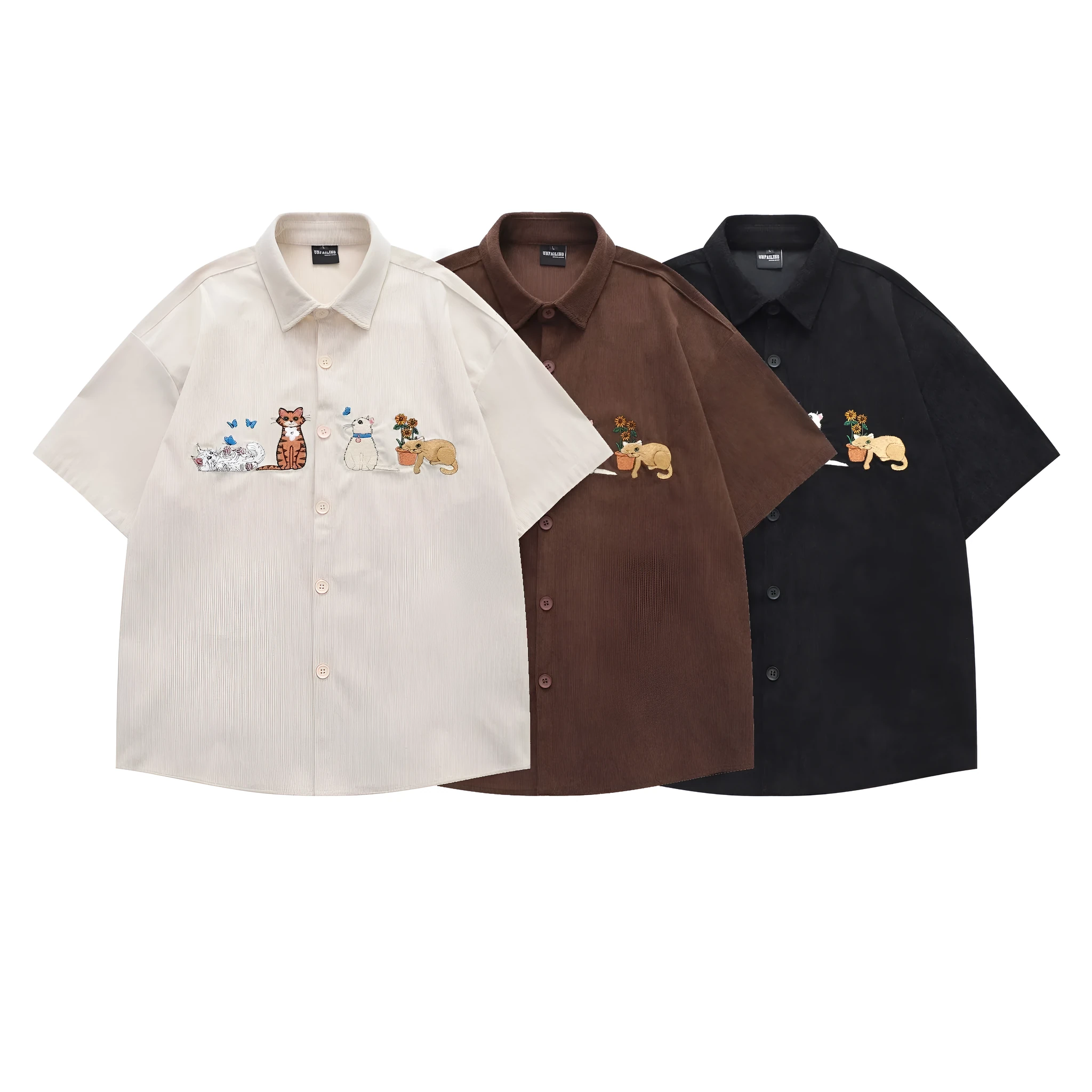 Loose apricot cardigan shirt with cartoon embroidery detail on the front