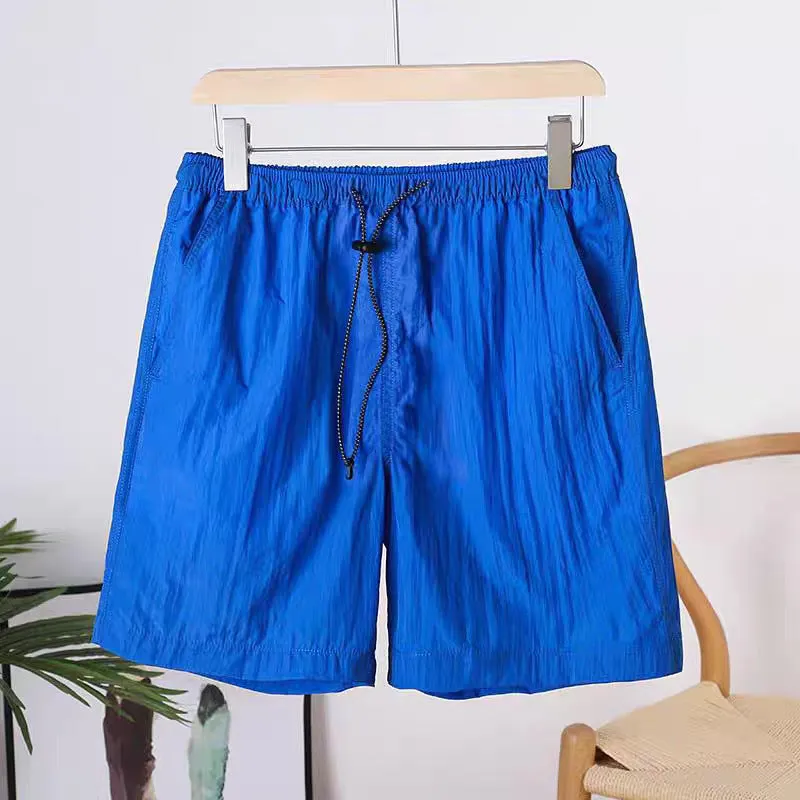 Men's straight-leg quick-drying sports shorts in chemical fibre blend fabric