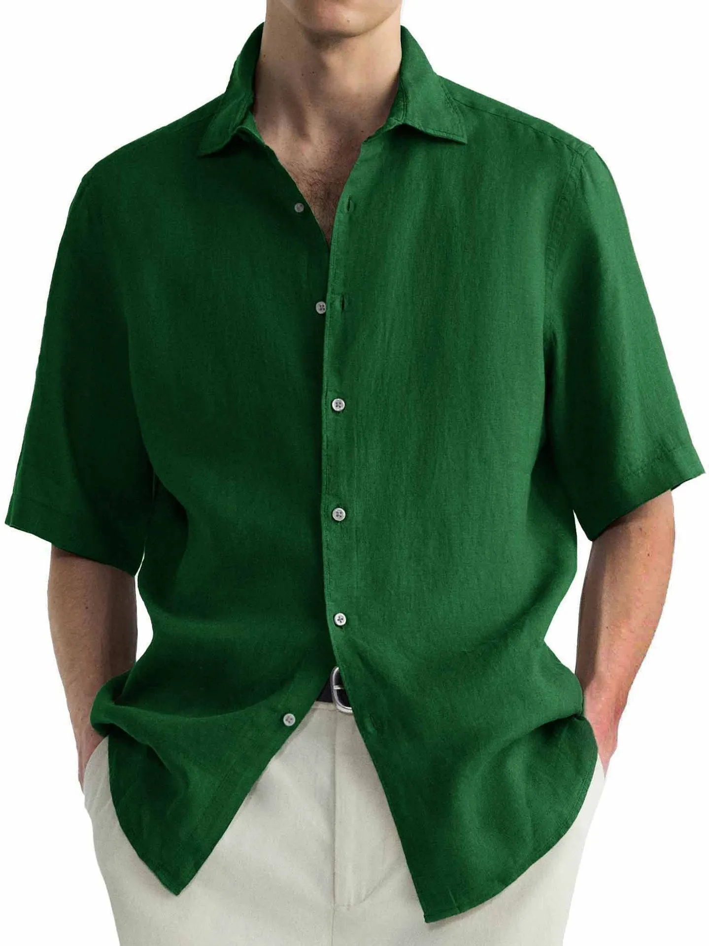 Man wearing a green washed cotton casual cardigan-style shirt.