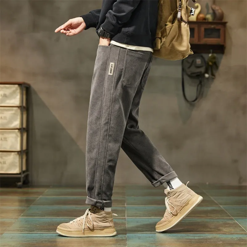 Men's corduroy casual trousers in tapered straight-leg design with street fashion styling