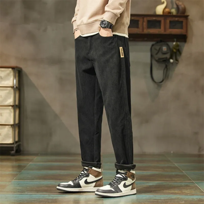 Men's corduroy casual trousers in tapered straight-leg design with street fashion styling