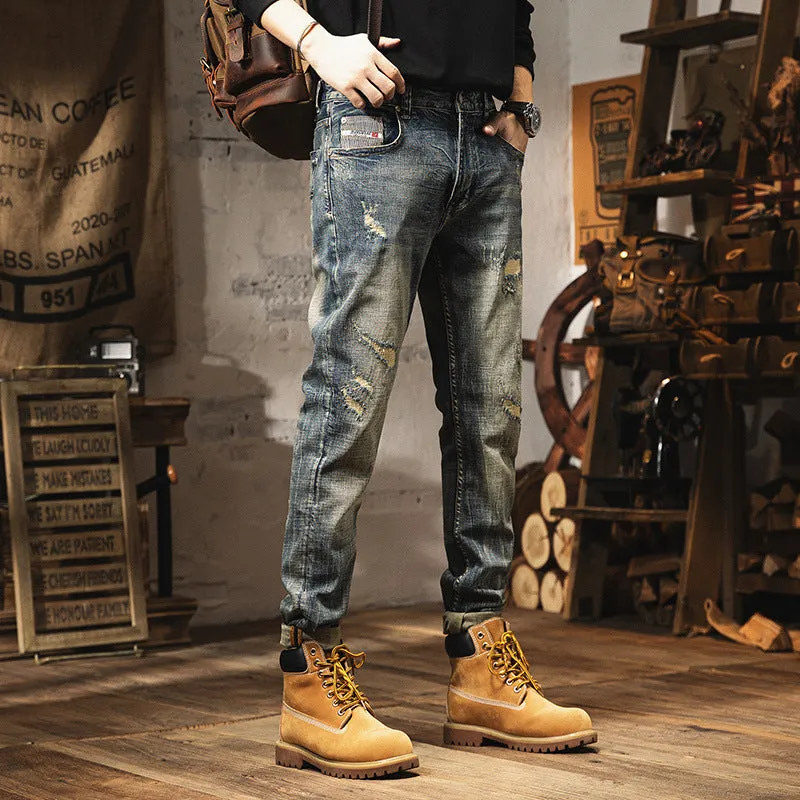 Man wearing vintage blue loose-fit jeans with a fleece lining and drawstring waist.