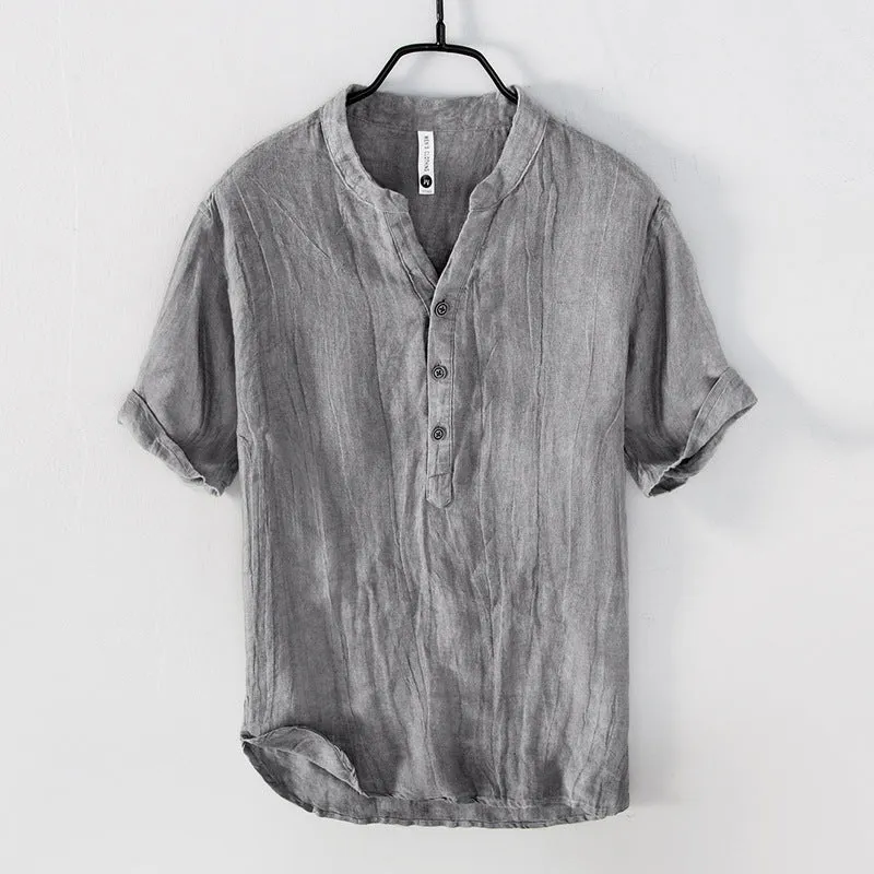 Men's grey linen short sleeve pullover top on a hanger