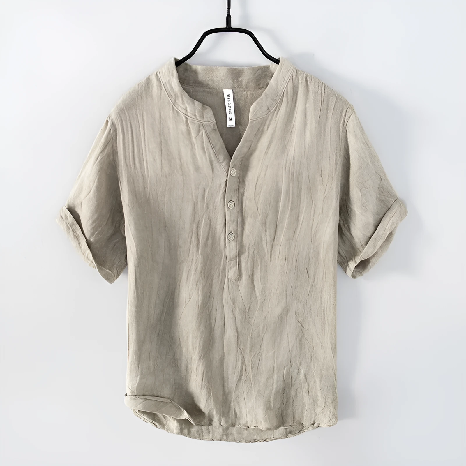 Men's grey linen short sleeve pullover top on a hanger