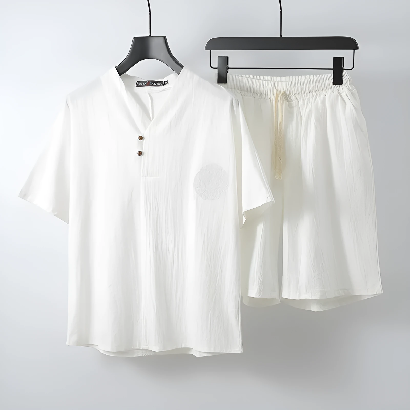 Men's loose linen cotton two-piece set with short-sleeved top and shorts in apricot colour.