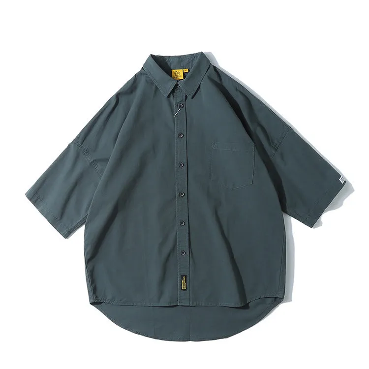 Man wearing a loose-fit Japanese style cotton cardigan shirt in a summer colour.