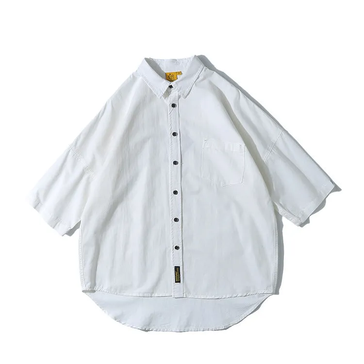 Man wearing a loose-fit Japanese style cotton cardigan shirt in a summer colour.