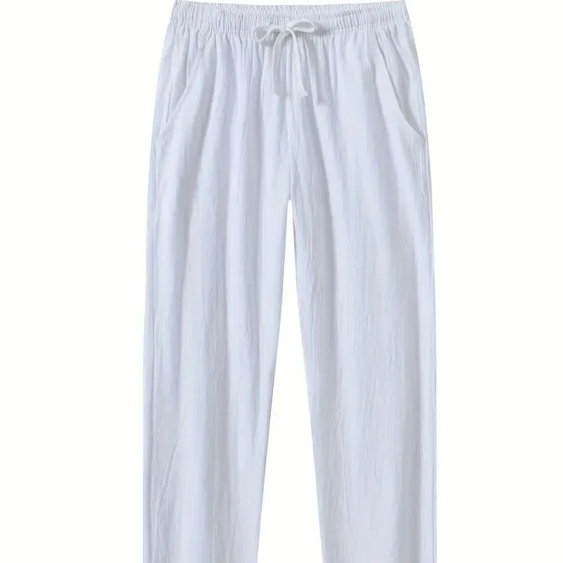 Men's loose-fitting cotton beach pants in khaki colour on a casual background.