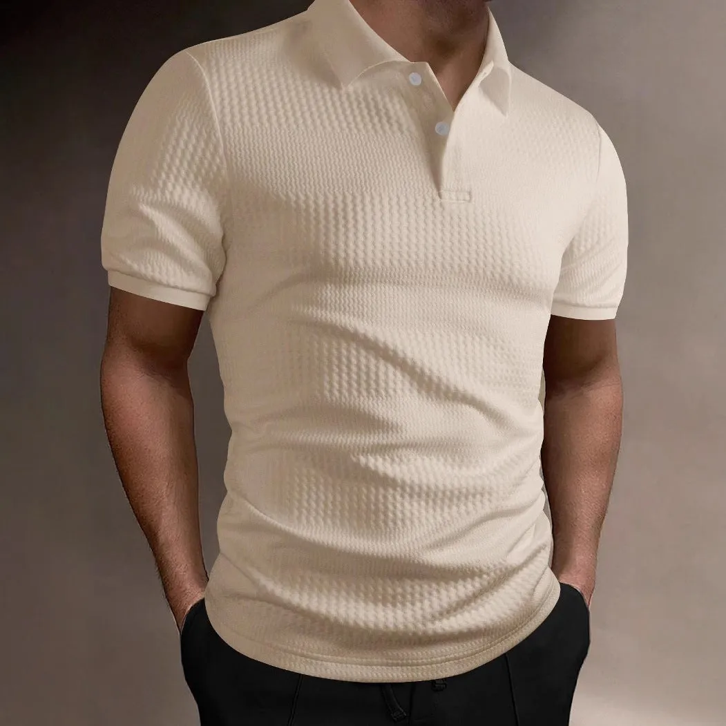 Man wearing a loose fit striped polo shirt in a light blue colour with an asymmetric design detail.
