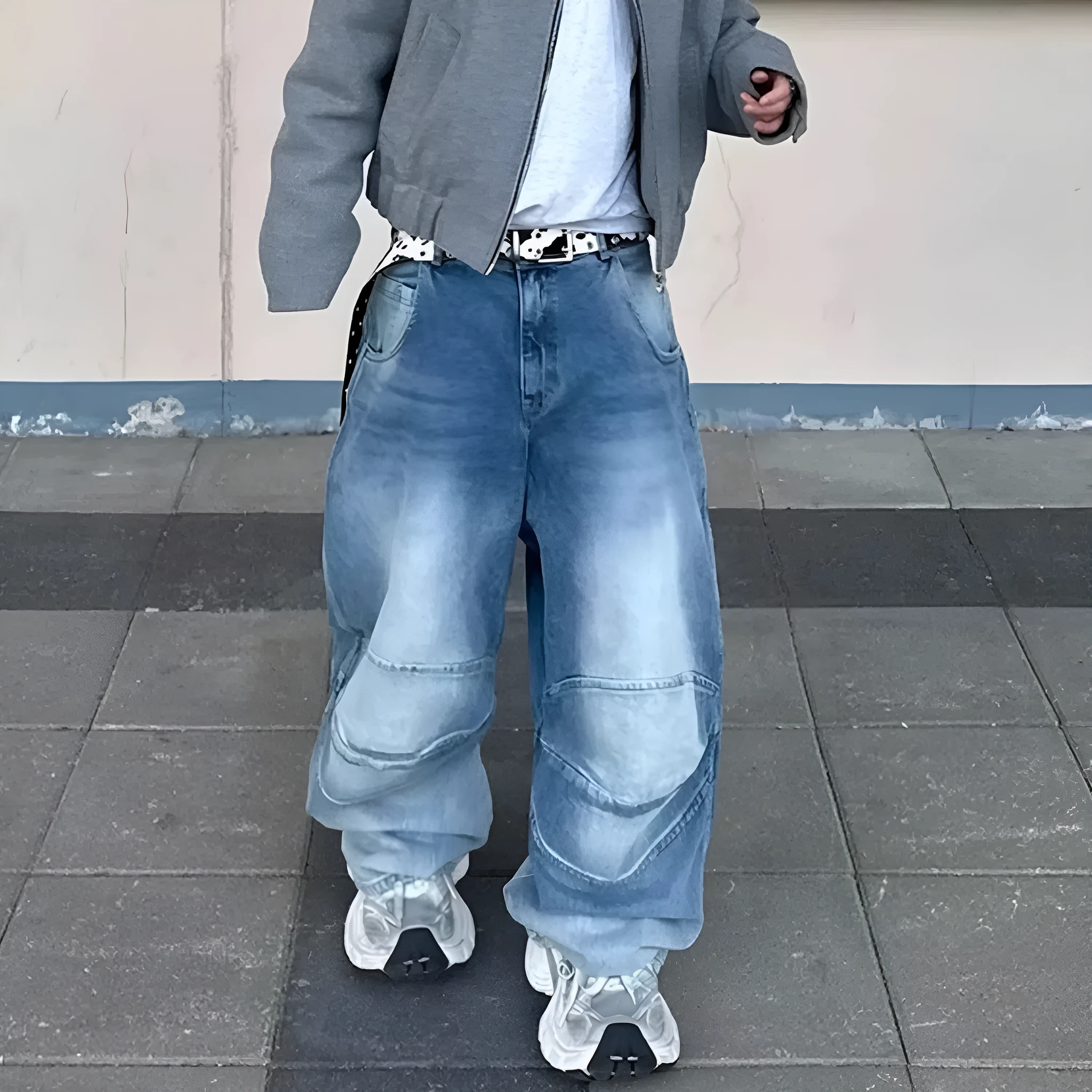 Men's washed blue baggy jeans with pleated front detail and straight-leg cut