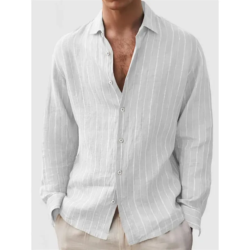 Man wearing a loose-fit, striped, short-sleeve cardigan shirt in a casual setting.