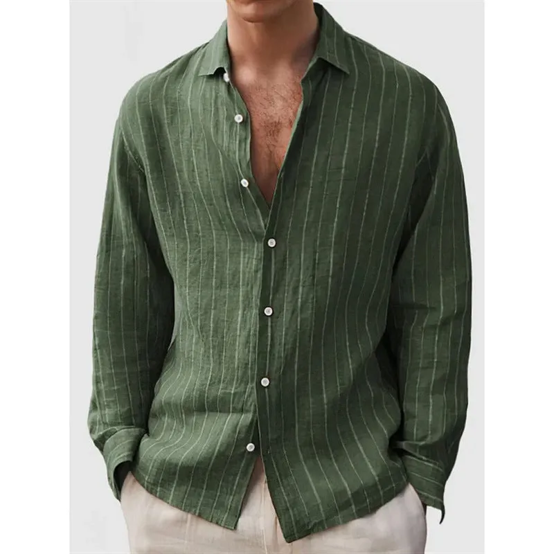 Man wearing a loose-fit, striped, short-sleeve cardigan shirt in a casual setting.