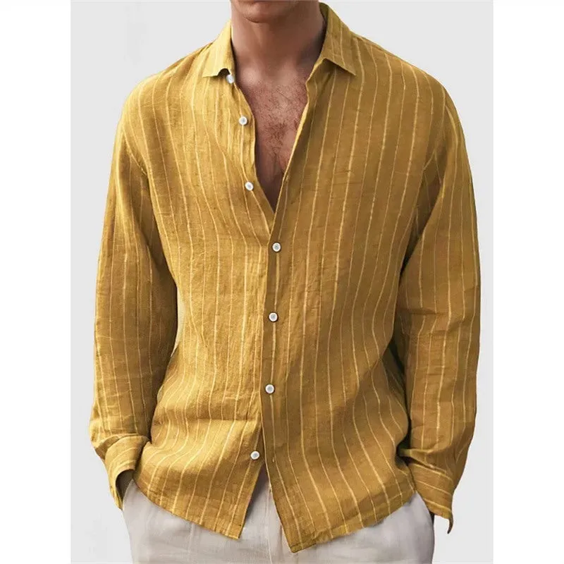 Man wearing a loose-fit, striped, short-sleeve cardigan shirt in a casual setting.