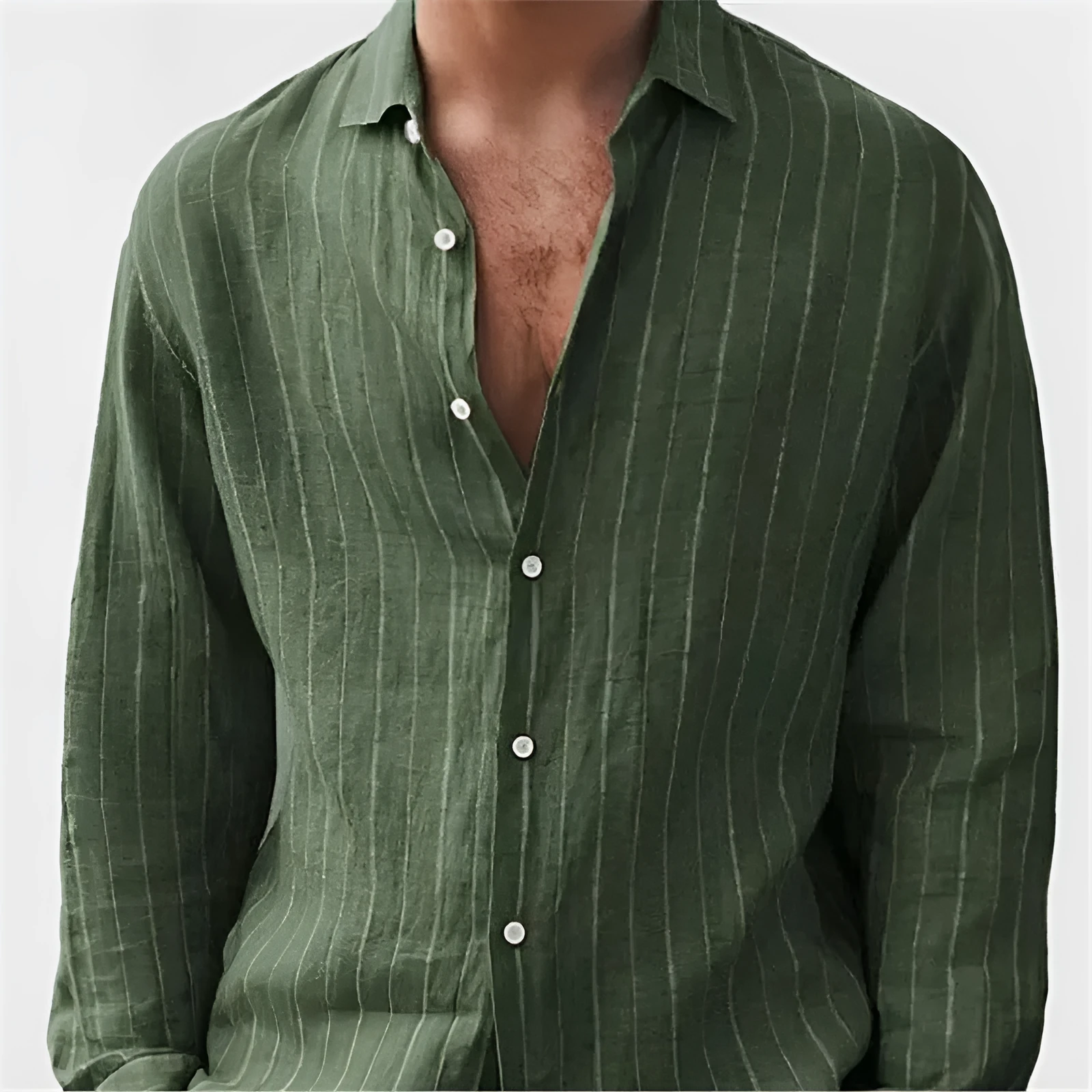 Man wearing a loose-fit, striped, short-sleeve cardigan shirt in a casual setting.
