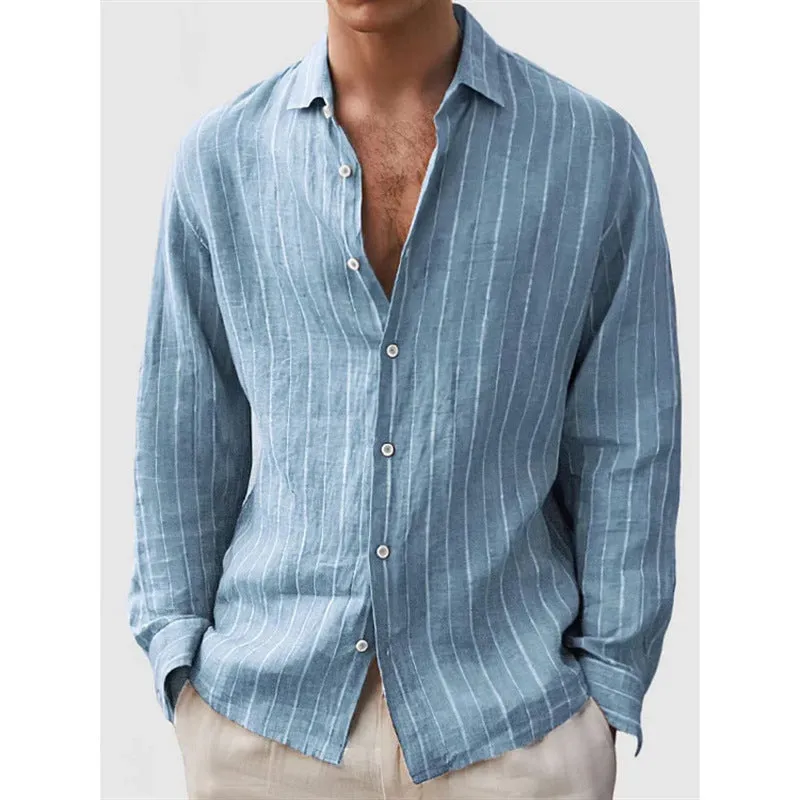 Man wearing a loose-fit, striped, short-sleeve cardigan shirt in a casual setting.