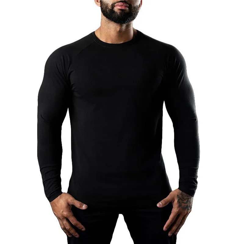 Men's tight-fitting long sleeve cotton sports T-shirt in grey, worn for gym training.