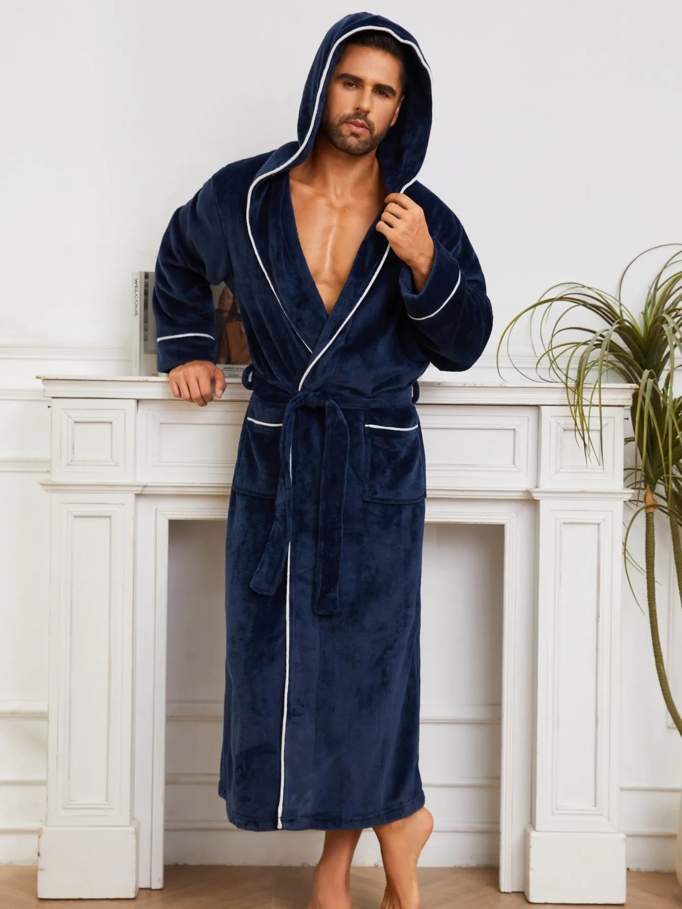 Man wearing a light grey flannel bathrobe in a European style for winter.