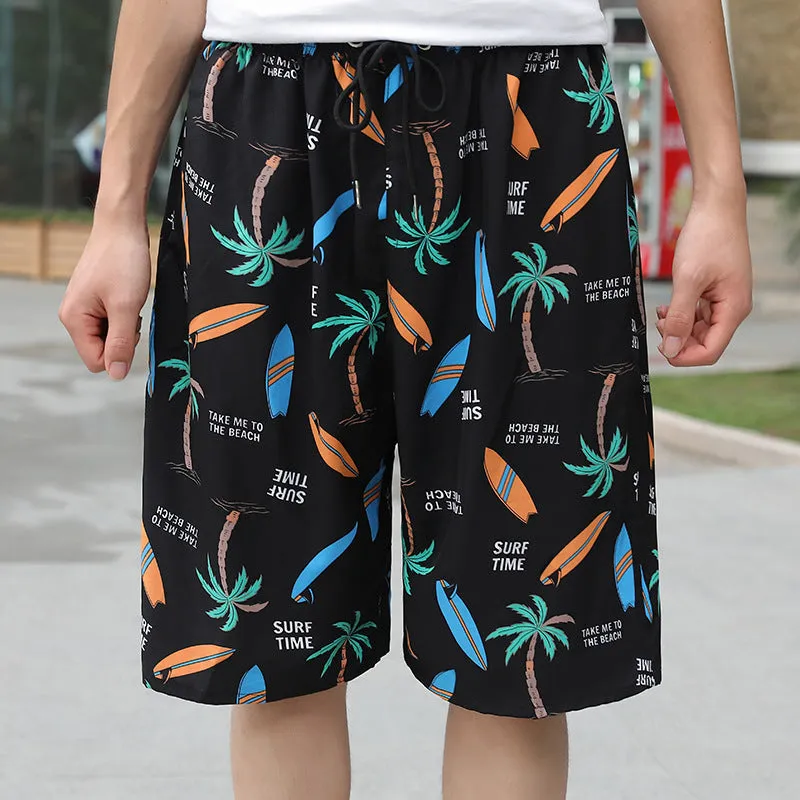 Man wearing loose striped ice silk beach trousers on sand