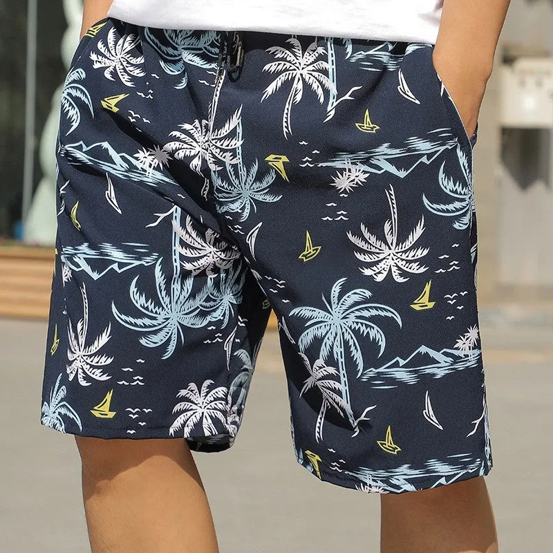 Man wearing loose striped ice silk beach trousers on sand
