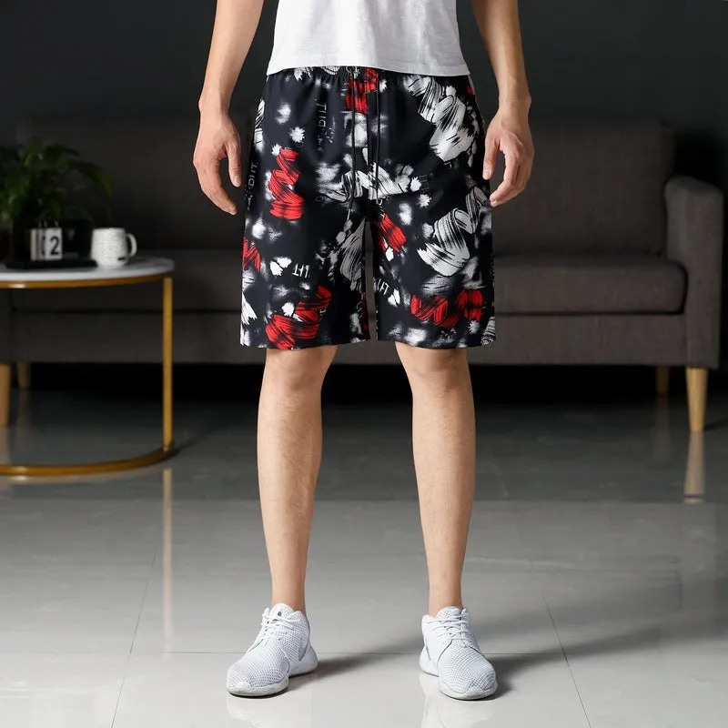 Man wearing loose striped ice silk beach trousers on sand