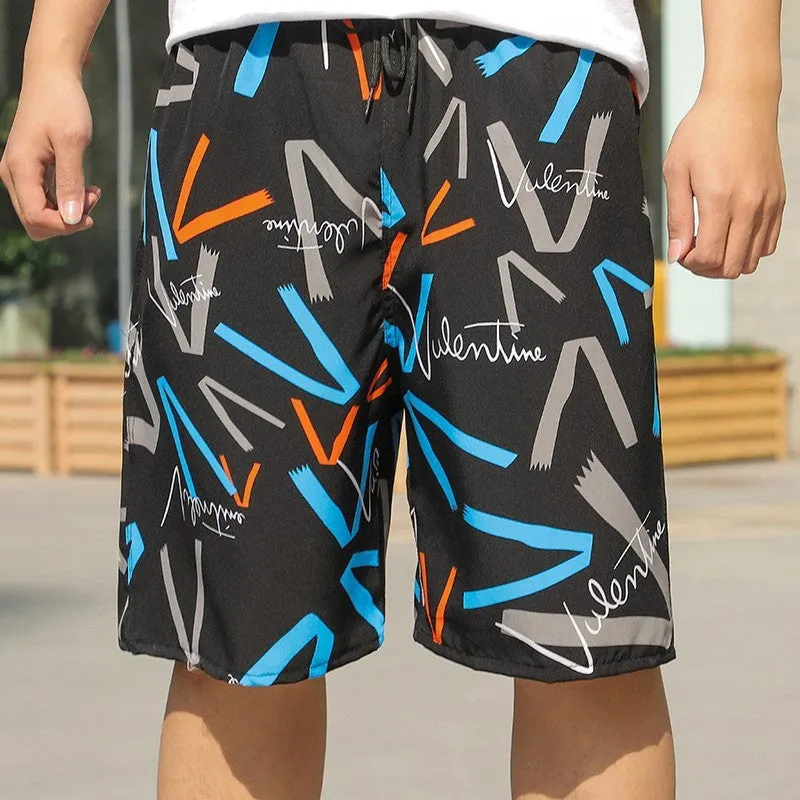 Man wearing loose striped ice silk beach trousers on sand