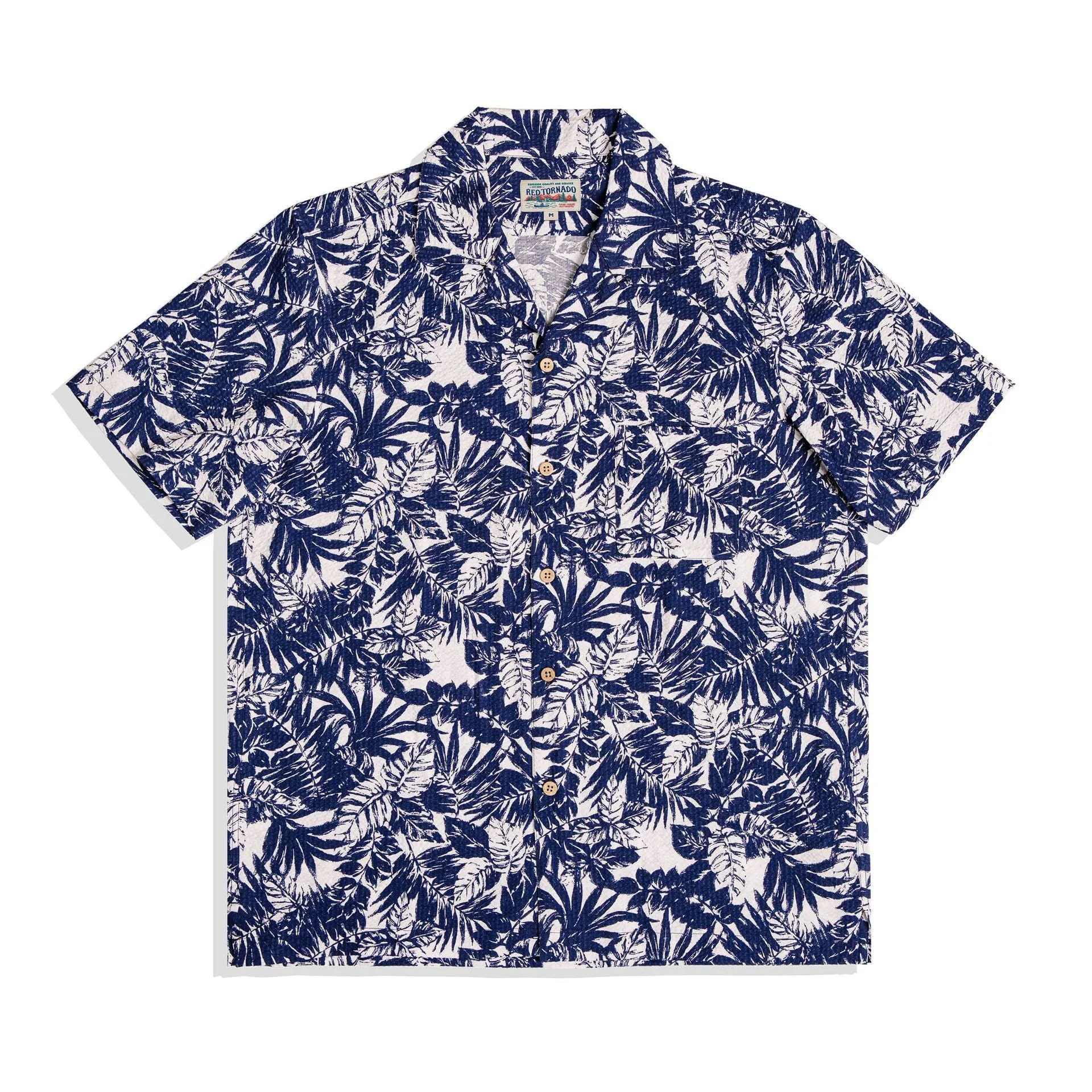 Vintage floral print seersucker shirt with a Cuban collar on a mannequin, showing loose cardigan fit.