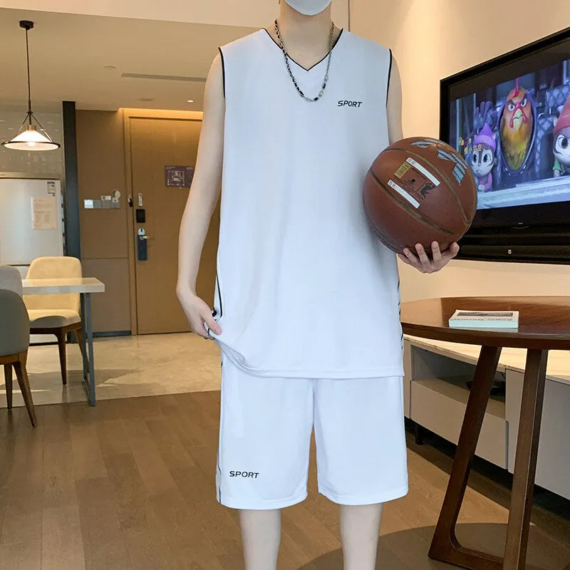 Men's grey polyester sleeveless basketball vest and matching shorts sports set laid flat