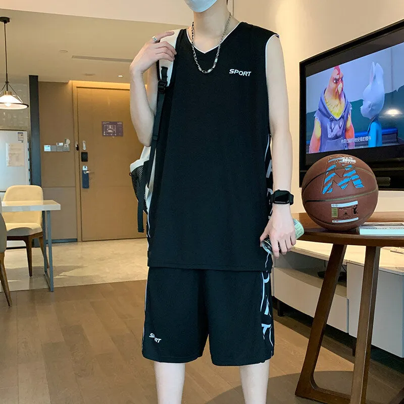 Men's grey polyester sleeveless basketball vest and matching shorts sports set laid flat